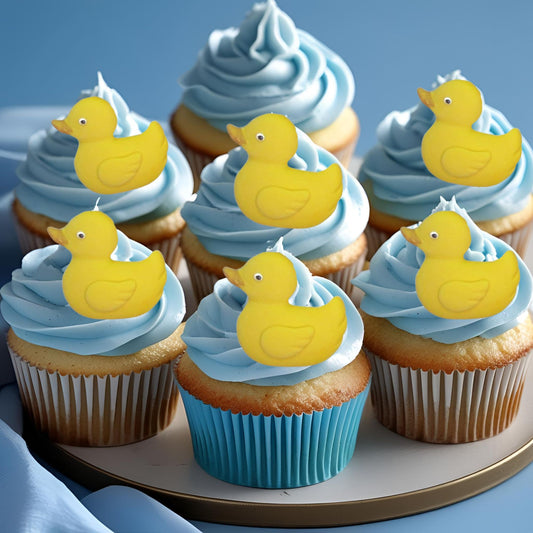 cupcake with blue frosting showcasing 6 edible yellow duck decorations