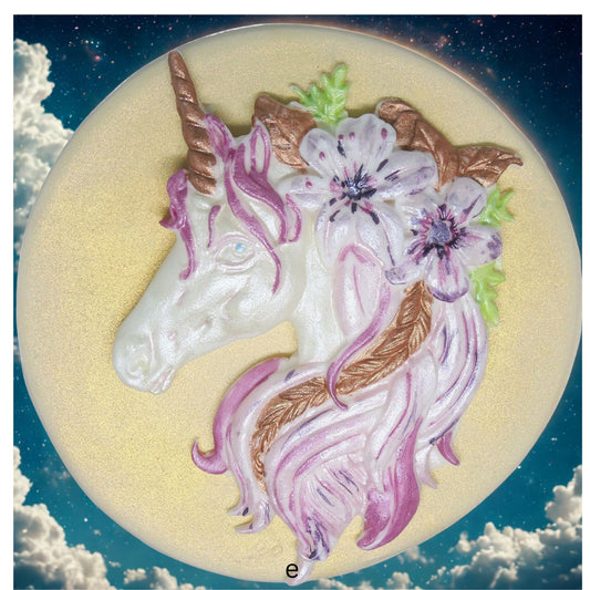 Unicorn with flowers cake decoration on a circular background with cloud background image