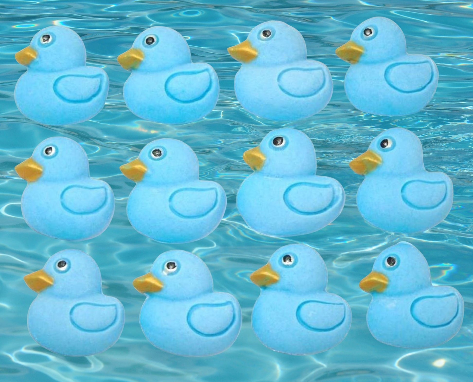 12 blue ducks cupcake toppers image shows them on water