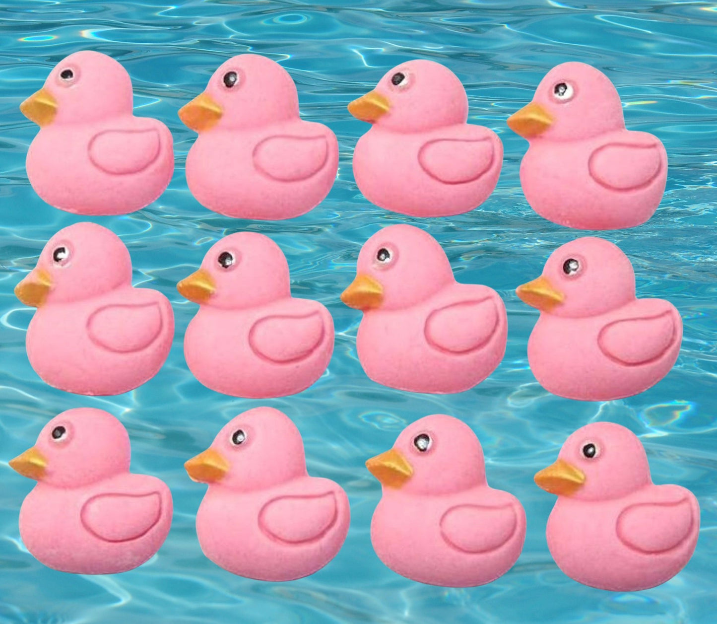 12 pink ducks cupcake toppers image shows them on water