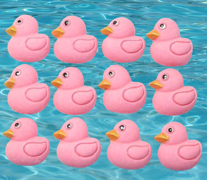 12 pink ducks cupcake toppers image shows them on water