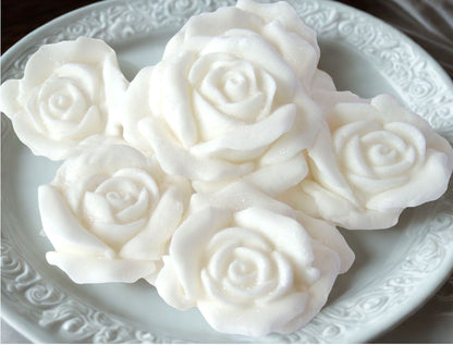 6 White Glittered roses on a plate