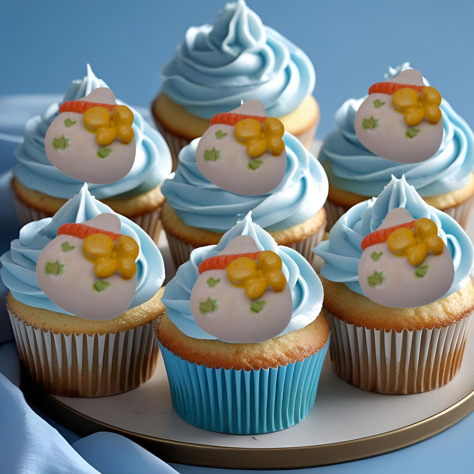 6 Chunky edible baby bottles decorations on blue frosting cupcakes