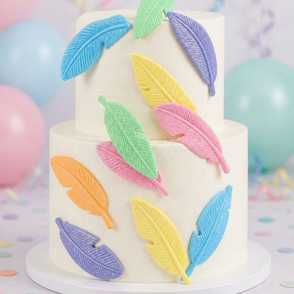 Mix coloured glittered feathers on the front of a white cake