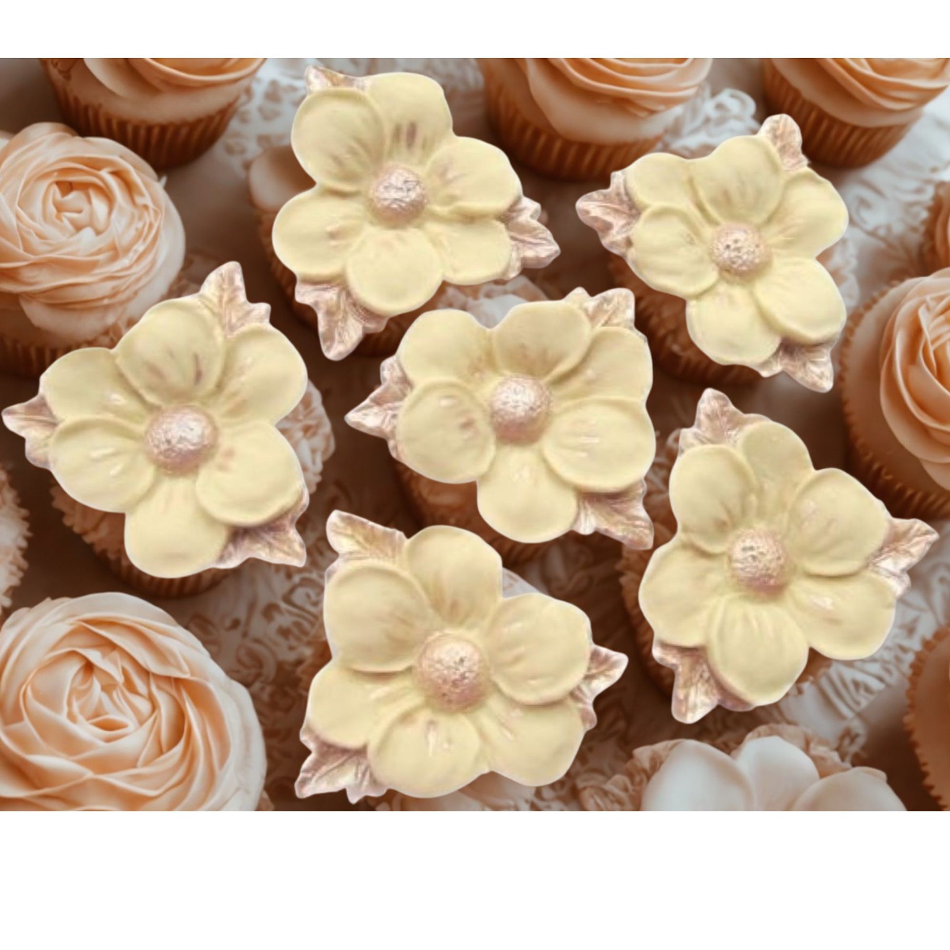 Cream vegan flowers with painted silver leaves 