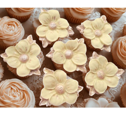 Cream vegan flowers with painted silver leaves 
