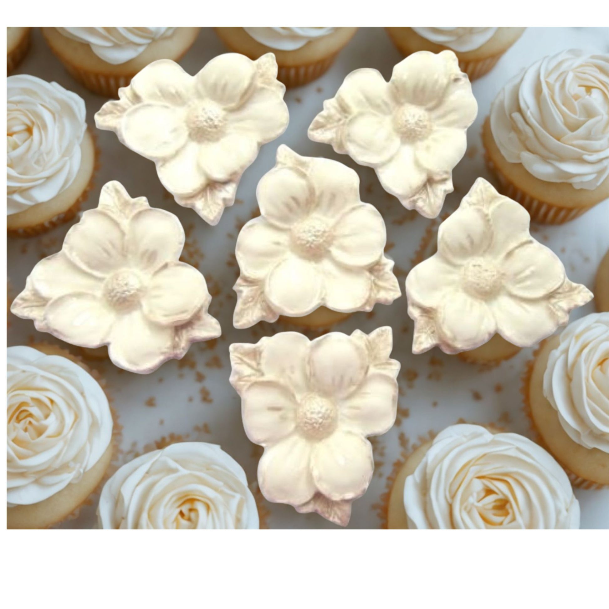 Ivory vegan flowers with painted silver leaves 