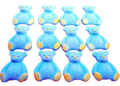 A set of blue edible teddy bear cupcake toppers arranged in rows on a white background