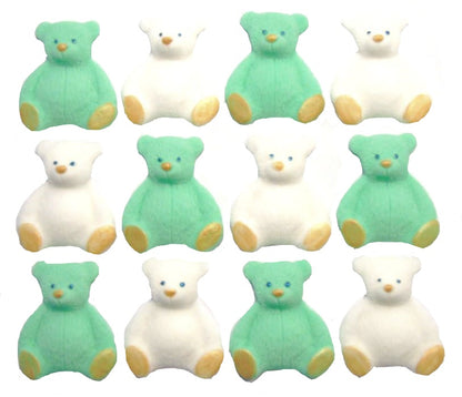 A set of green and white edible teddy bear cupcake toppers arranged in rows on a white background