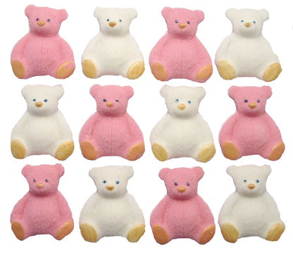 A set of pink and White edible teddy bear cupcake toppers arranged in rows on a white background