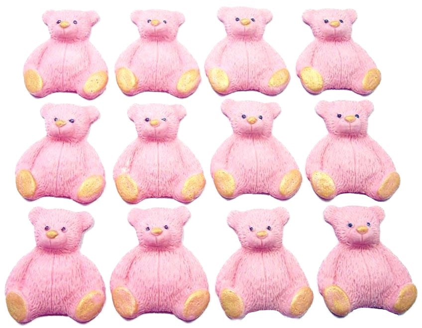 A set of Pink edible teddy bear cupcake toppers arranged in rows on a white background