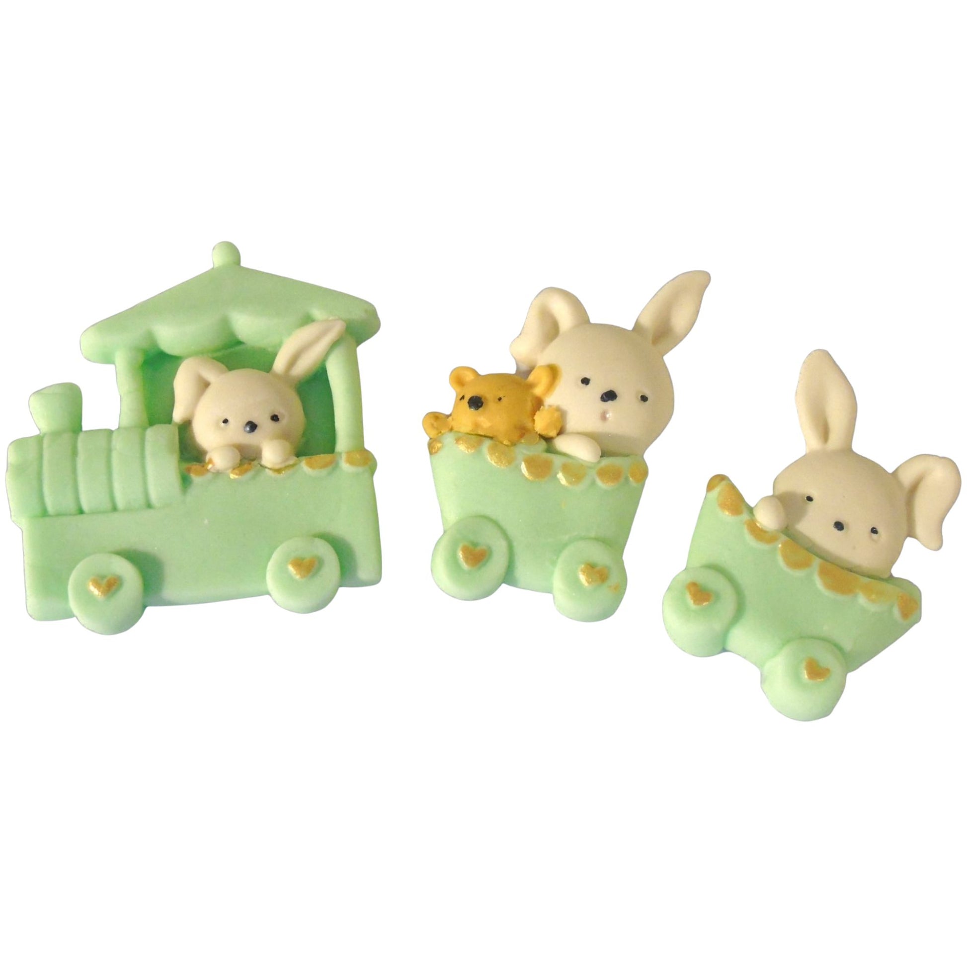 Three small green carriages with rabbit figures on a white background