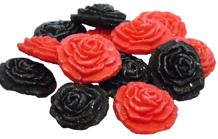 A collection of handmade edible glittered rose cupcake toppers in Red and Black  colors