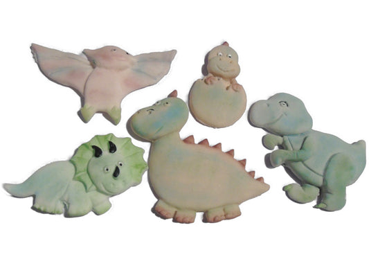 Set of colorful dinosaur figurines cake topper decorations  on a white background