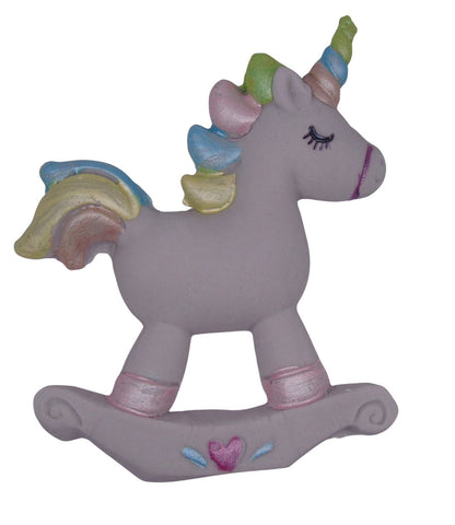 Unicorn-shaped cake topper with colorful mane and tail on a white background