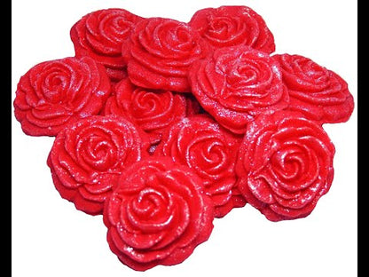 12 Red  edible glittered roses on a white background