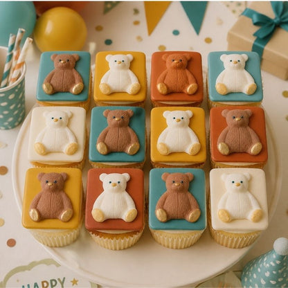 white and brown teddies on top of cupcakes