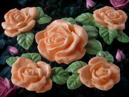 Close-up of a cake with Peach roses decorations on  a flower background